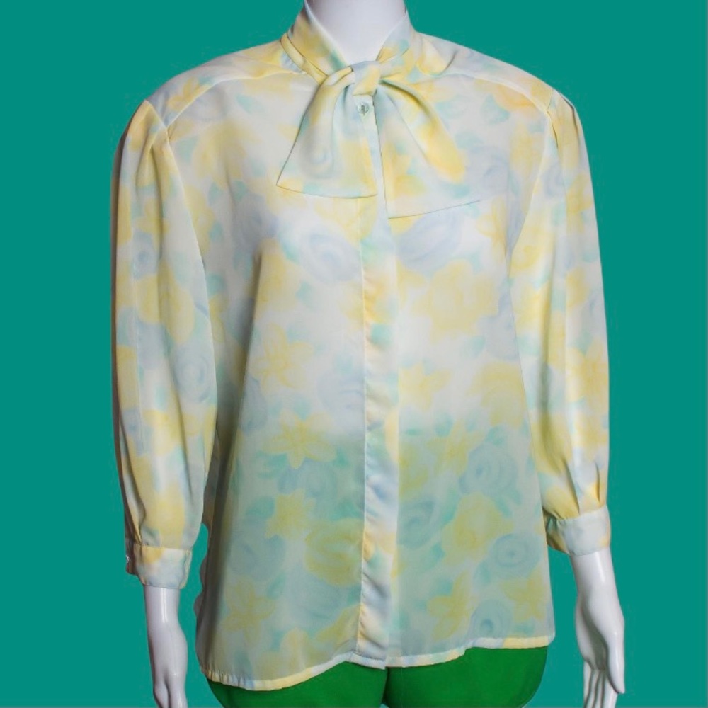 Vintage Floral Shear Button Up Blouse. Top has a ribbon that forms a bow